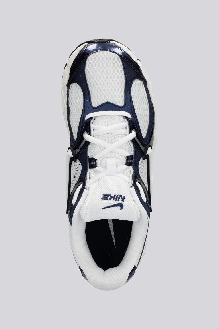 6779895