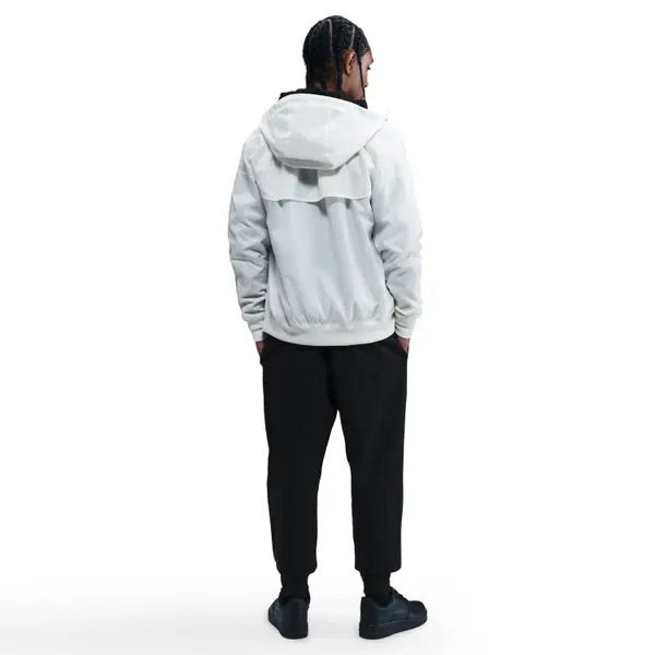 7050872